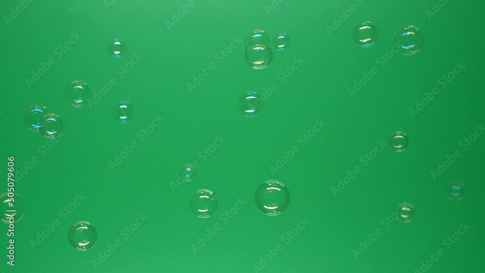 Slow motion of soap air bubbles texture on chroma key green screen ...