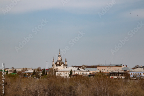 View of the city of Shadrinsk from the side of the Iset river. View of the city of Shadrinsk in the Kurgan region from the side of the bridge over the Iset river. photo