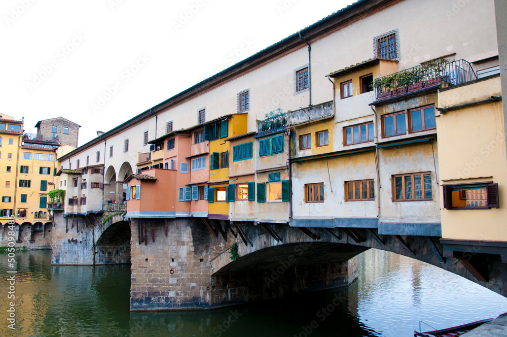 Historic Ponte Vecchio arch bridge over Arno river in Florence, Italy