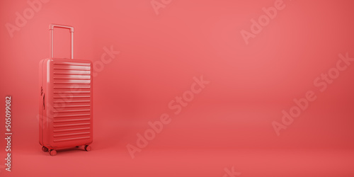 Obraz na plátně Business travel and vacation concept red suitcase on blank bright red wallpaper with copyspace for your text