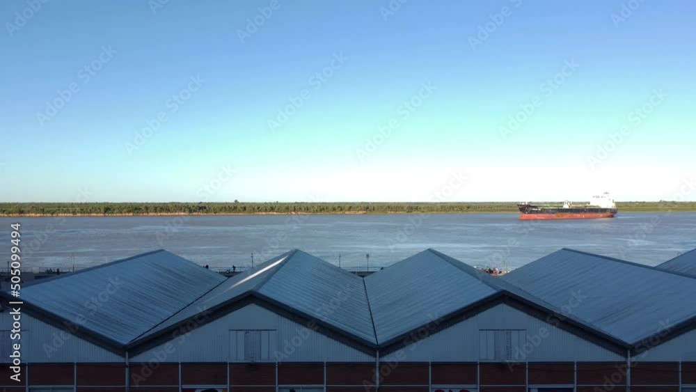 Aerial of freight ship in parana River, Rosario, Argentina Aerial of freight ship in parana River, Rosario, Argentina