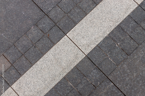 Texture of gray street tiles