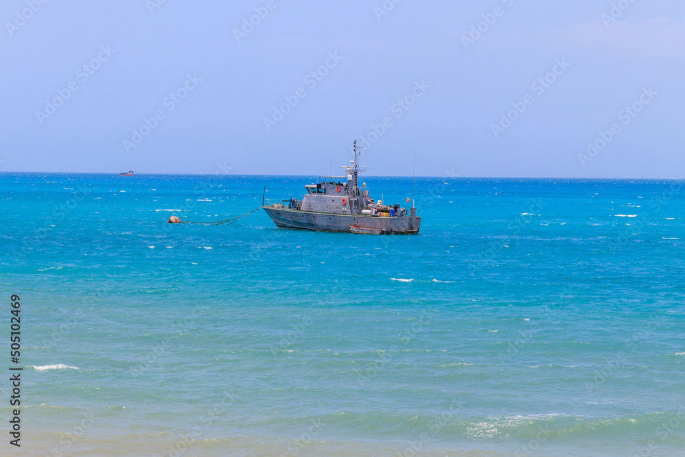 Warship anchored in the Indian ocean near Zanzibar, Tanzania