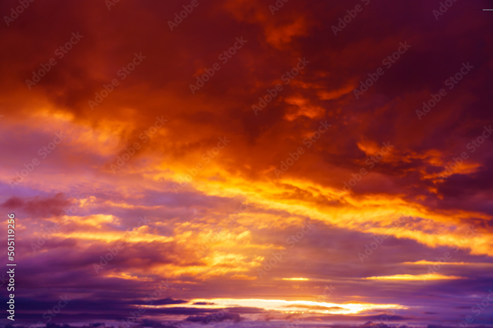 Meditative calmness and greatness. Amazing sky panorama. Mystical lighting. Clouds illuminated by the setting sun. Great dramatic view. Colorful sunset in the evening sky