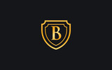 Double shield and golden elegant logo design vector with the letter B