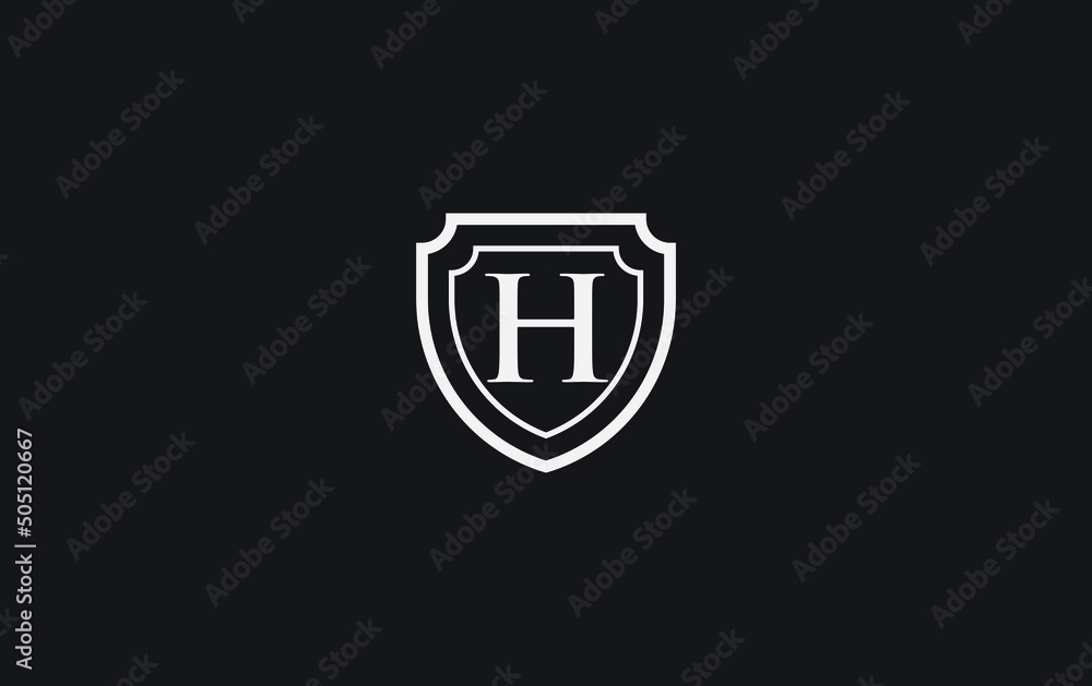 Double shield and golden elegant logo design vector with the letter H Double shield and golden elegant logo design vector with the letter H