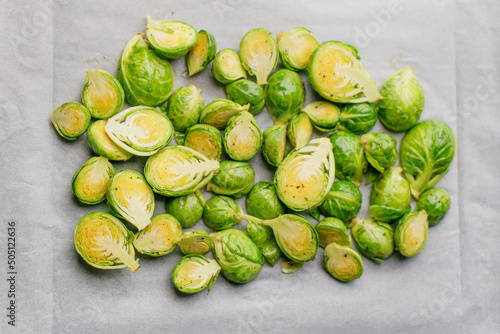 Brussels sprouts. Brussels sprouts cut in half and baked in the oven. Texture from vegetable food. A delicious nutritious meal. Healthy vegetarian food