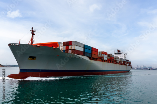Big size container ship full speed sailing in deep sea for transporting cargo logistic import and export goods internationally around the world, including Asia Pacific and Europe,