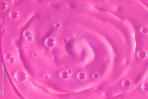 Bubble purple background texture. Berry gel to cleanse the skin of the face and body. Spa treatments  skin care. Bath foam  detergent. Slime pink.