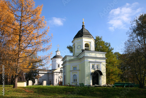 View of the summer Church of the Nativity of the Blessed Virgin Mary and the winter church of Peter and Paul in the Marfino estate. Moscow Region, Russia photo