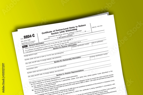 Form 8804-C documentation published IRS USA 07.17.2012. American tax document on colored © dmitriy