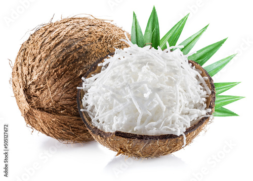 Fotografia Coconut nuts with coconut flakes and leaves isolated on a white background