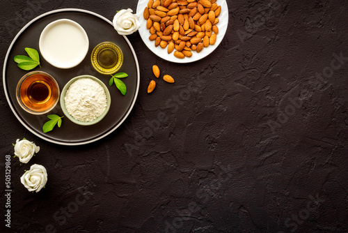 Almond products - oil milk flour with nuts. Organic food and cosmetic background