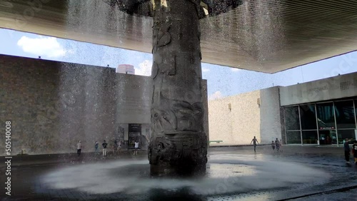 shot of fountain inside museo nacional de antropologia in mexico city photo