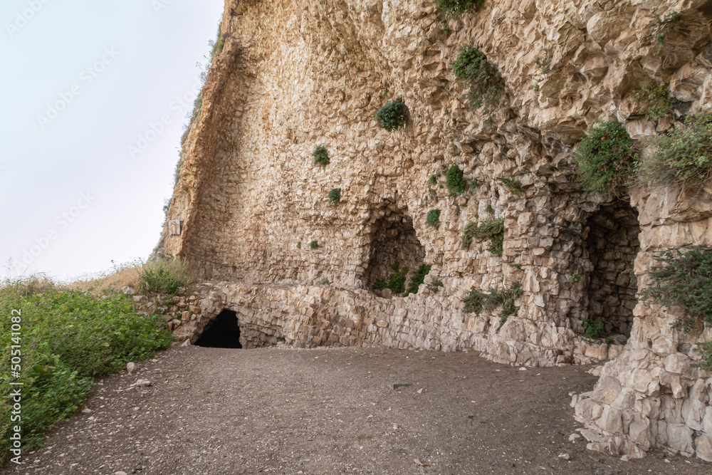The remains  of the buildings of the ancient settlement on Mount Arbel, located on the coast of Lake Kinneret - the Sea of Galilee, near the city of Tiberias, in northern Israel
