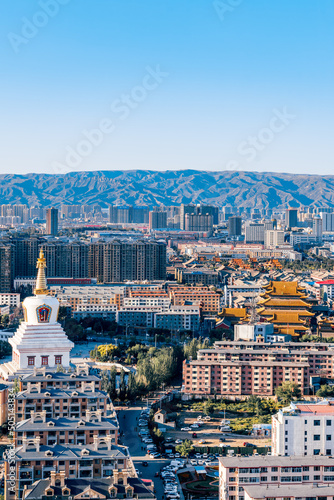 City skyline with architectural perspective of Baoerhan Pagoda, Guanyin Temple and Dazhao Temple in Hohhot, Inner Mongolia