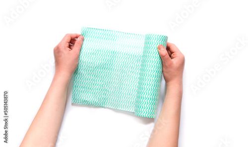 hand holding towel over isolated white background