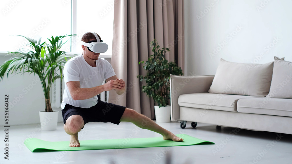 young man in sports clothing doing squat while wearing virtual reality  glasses. Training Via Augmented Reality Application, Futuristic Fitness,  Smart Sport And Technology Concept Stock Photo | Adobe Stock