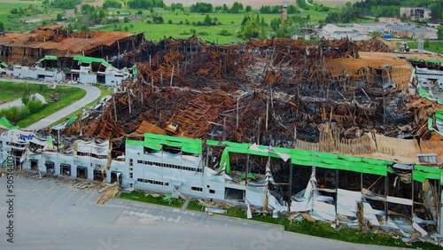 Kalynivka, Kyiv region, Ukraine - May 15, 2022: War in Ukraine. A destroyed Logistics Park after russian atack in Febrary photo