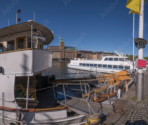 For of an old steam boat not in duty at a pier in the bay Nybroviken a sunny day in Stockholm photo