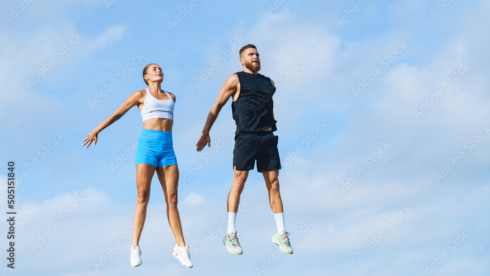A young couple goes in for sports outdoors. Healthy lifestyle.