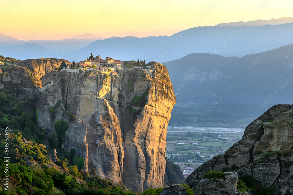Beautiful view of the famous Eastern Orthodox monasteries at sunset. Greece, Europe. landscape place of monasteries on the rock. UNESCO World Heritage.