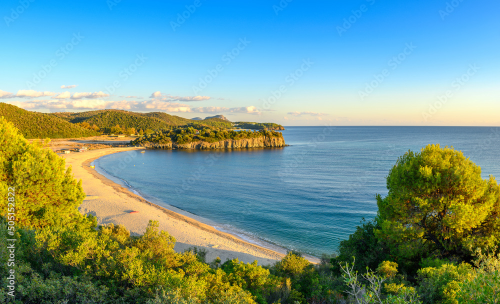 Beautiful panorama of summer seascape of Mediterranean sea. Green hills of Peloponnese peninsula, Greece, Europe.