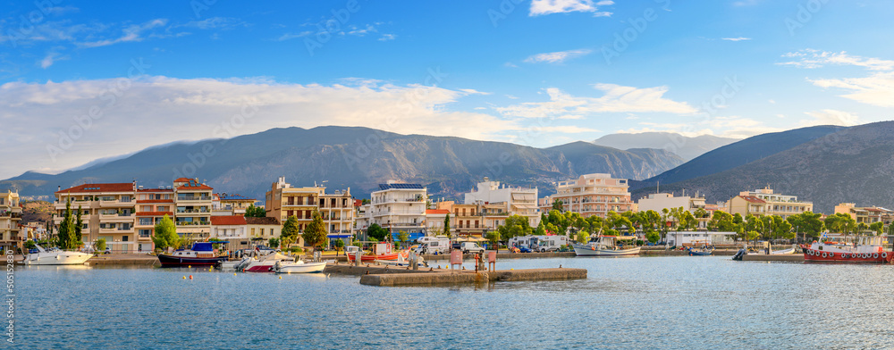 Yachts and boats in marina in resort town. Docked luxury yacht Boat in a port..