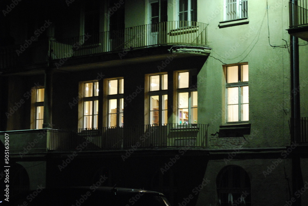 building at night, illuminated facade, gloomy - obrazy, fototapety, plakaty 