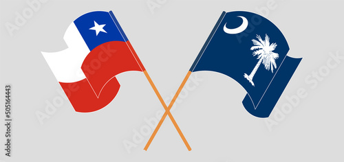 Crossed and waving flags of Chile and The State of South Carolina
