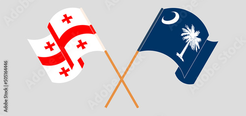Crossed and waving flags of Georgia and The State of South Carolina