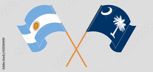 Crossed and waving flags of Argentina and The State of South Carolina