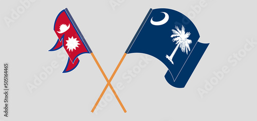 Crossed and waving flags of Nepal and The State of South Carolina