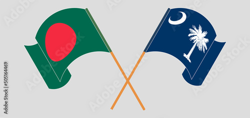Crossed and waving flags of Bangladesh and The State of South Carolina