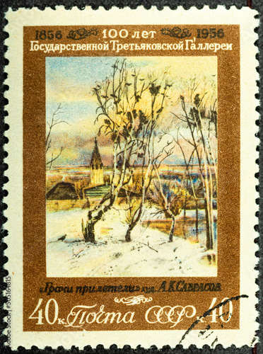 RUSSIA - CIRCA 1956: A stamp printed by Russia, shows The Rooks Have Arrived by A. K. Savrasov, circa 1956. photo