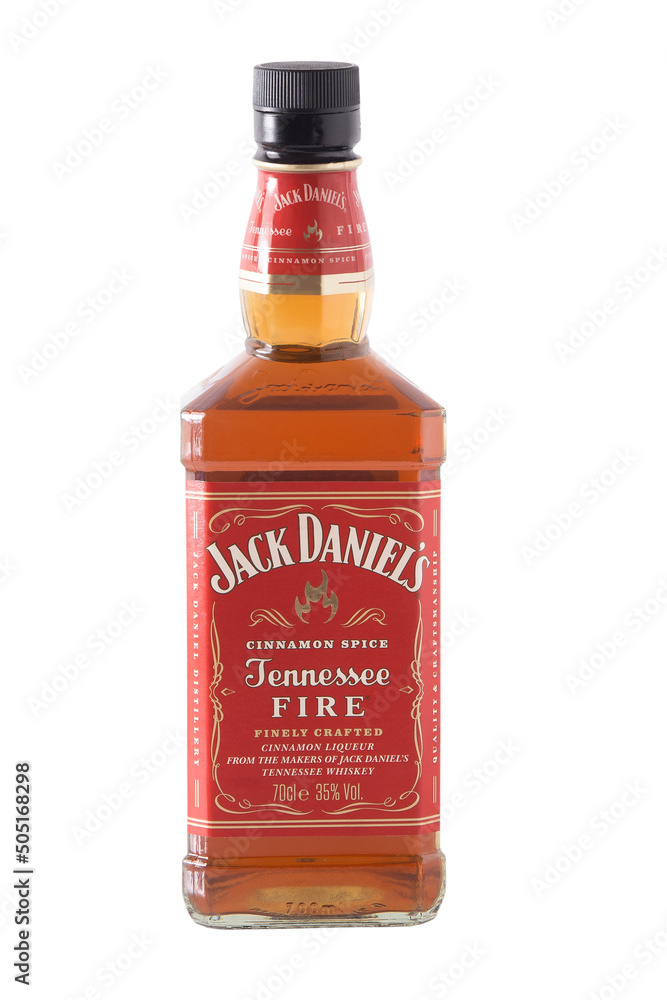 Whiskey bottle Jack Daniels Red label isolated on white background.  Jennessee fire. Cinnamon liqueur from makers of Jack Daniel s tennessee  whiskey. Spice alcohol drink. Ukraine, Kyiv - May 17, 2022. Photos | Adobe  Stock