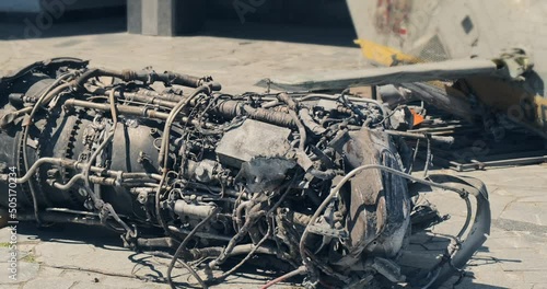 Helicopter debris which attacked Kiev 2022, at Museum of Second World War. War in Ukraine. Blown up, downed, burnt parts helicopter, close-up. Fragments of military equipment of occupiers of Russia  photo