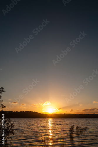 Autumn Sunset  with low cumulus clouds over Lough Gowna lake. Cavan  Ireland