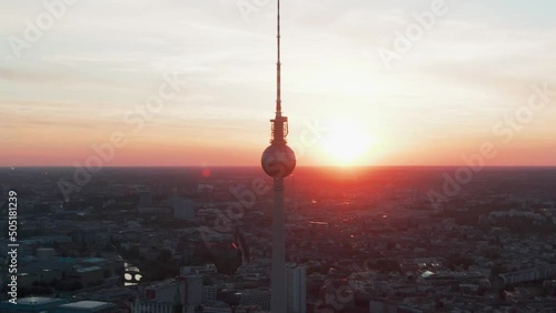Aerial view of tv tower and the rotes rathaus red cityhall at berlin Alexander Platz during sunset photo