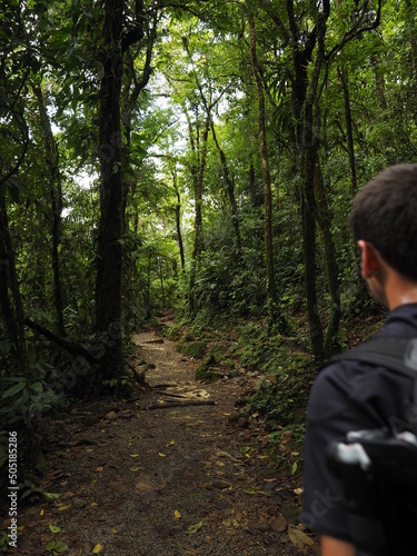 young man hiking in rio celeste