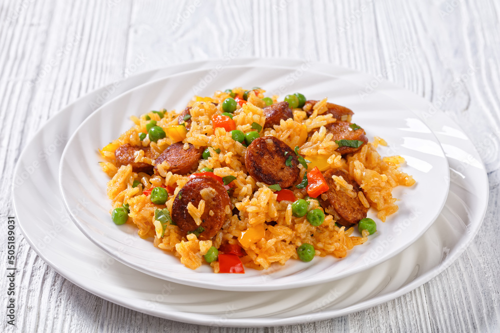 fried sausages with rice and vegetables, top view fried sausages with rice and vegetables, top view