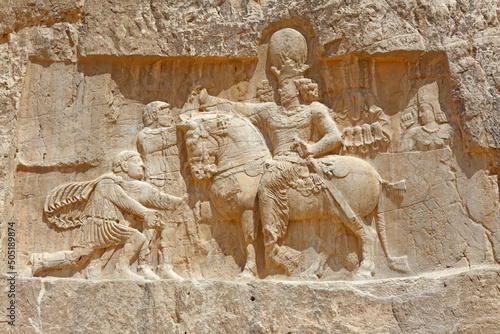 The triumph of Shapur I at Naqsh-e Rostam necropolis near Persepolis, Iran photo