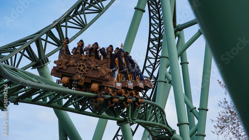 Sierksdorf, Germany - April.30.2022: Young people have fun during a ride at Hansapark roller coaster 