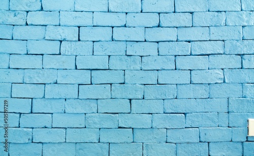 Colorful brick wall, bright blue vintage style of brick background, Texture of blue brick