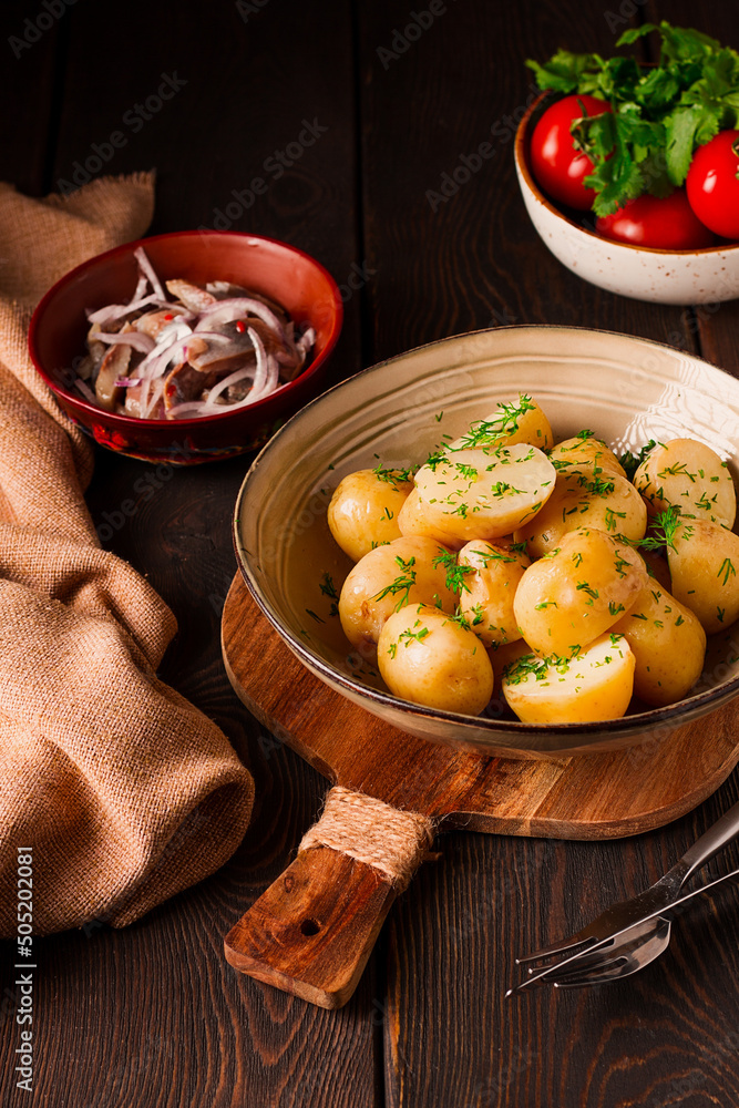 Fresh Cooked, new potatoes,with dill, on a wooden table, selective focus. close-up, toning, no people, Fresh Cooked, new potatoes,with dill, on a wooden table, selective focus. close-up, toning, no people,