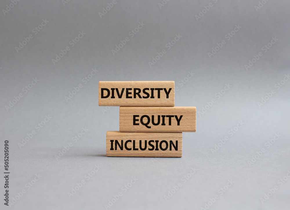 Diversity Equity Inclusion symbol. Concept words Diversity Equity Inclusion on wooden blocks. Beautiful grey background. Business and Diversity Equity Inclusion concept. Copy space. Diversity Equity Inclusion symbol. Concept words Diversity Equity Inclusion on wooden blocks. Beautiful grey background. Business and Diversity Equity Inclusion concept. Copy space.