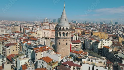 Galata Tower in Istanbul. Aerial view. Istanbul panorama. Galata tower in Istanbul, Turkie. Aerial drone shot from above, city centre, downtown. European part of the city. Sunny day, sunset. photo