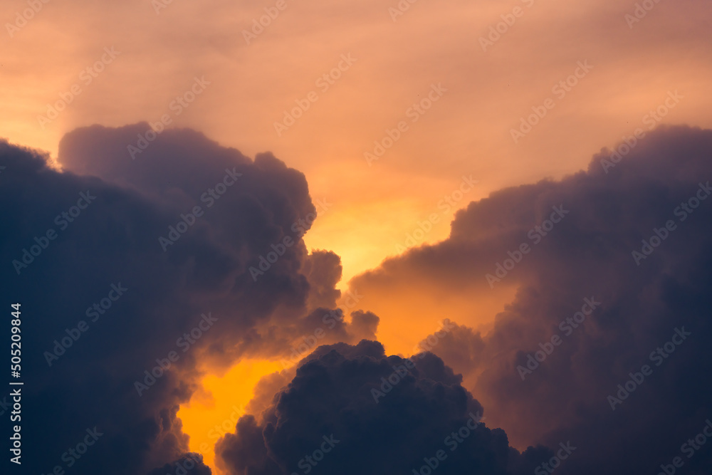 Beautiful dramatic sky and cumulus clouds in the sunset Beautiful dramatic sky and cumulus clouds in the sunset