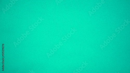 Mint green velvet fabric texture used as background. Empty mint pastel fabric background of soft and smooth textile material. There is space for text...