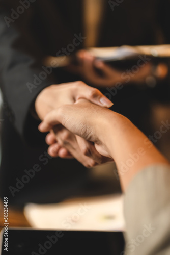 business hand meeting concept, businessman having handshake with corporate team about success with agreement of marketing work